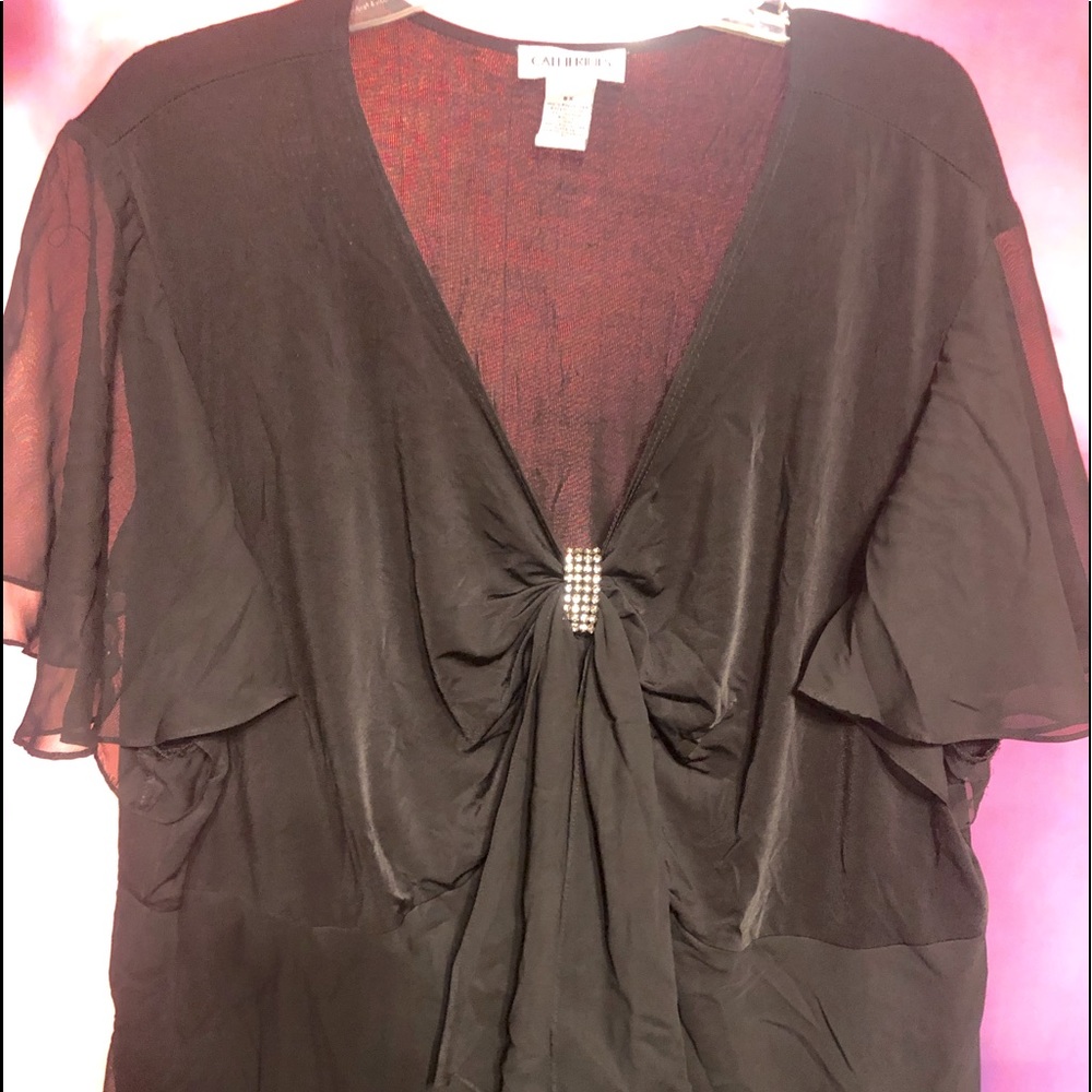 Black Catherine’s flowy dress top, embellished at V of neckline. 5X